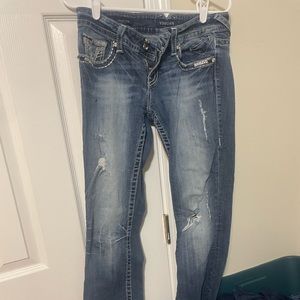 Bootcut jeans size 8. Distressed.